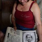 Irina Kushchenko, mother of accused spy Anna Chapman, with a childhood picture of Chapman